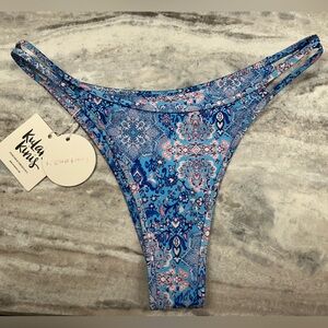 Twin strap cheeky bikini bottom. Kulani Kini brand new bottoms. Size medium